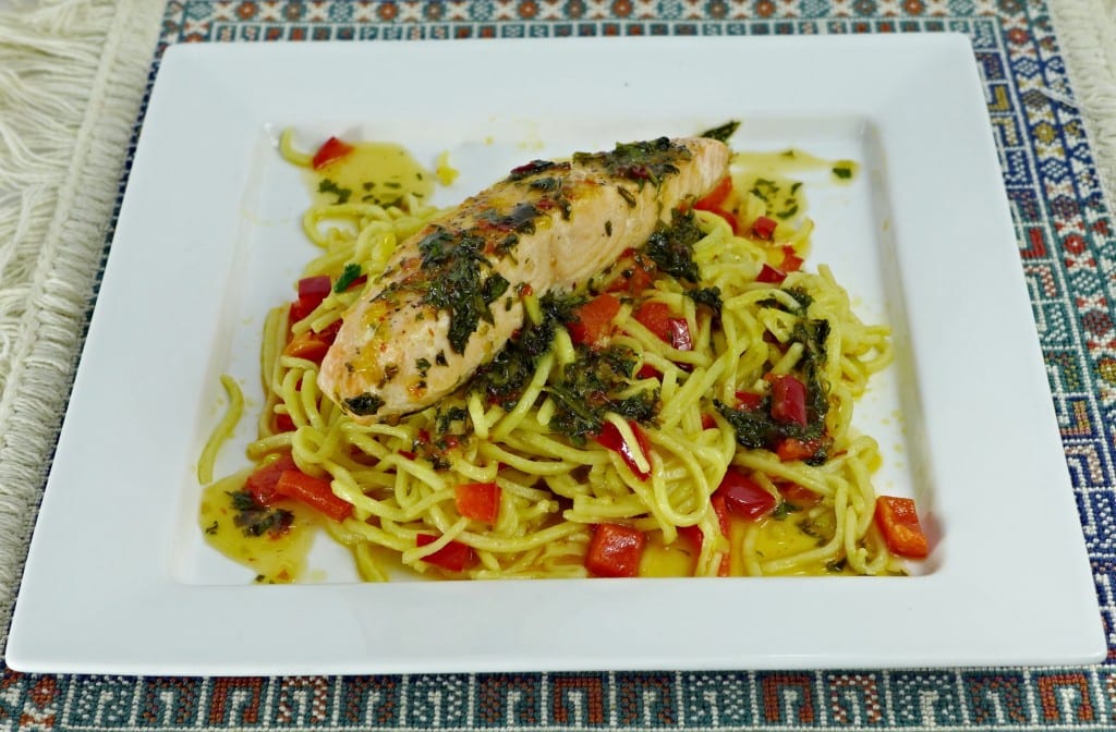 Scottish salmon on a bed of Asian ginger noodles finished with a sweet chilli and coriander butter