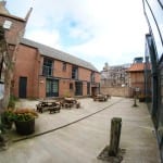 YHA Berwick - courtyard with picnic tables
