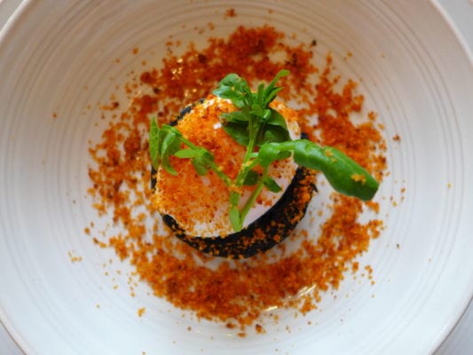 Stornoway black pudding, slow cooked duck egg and chorizo crumble