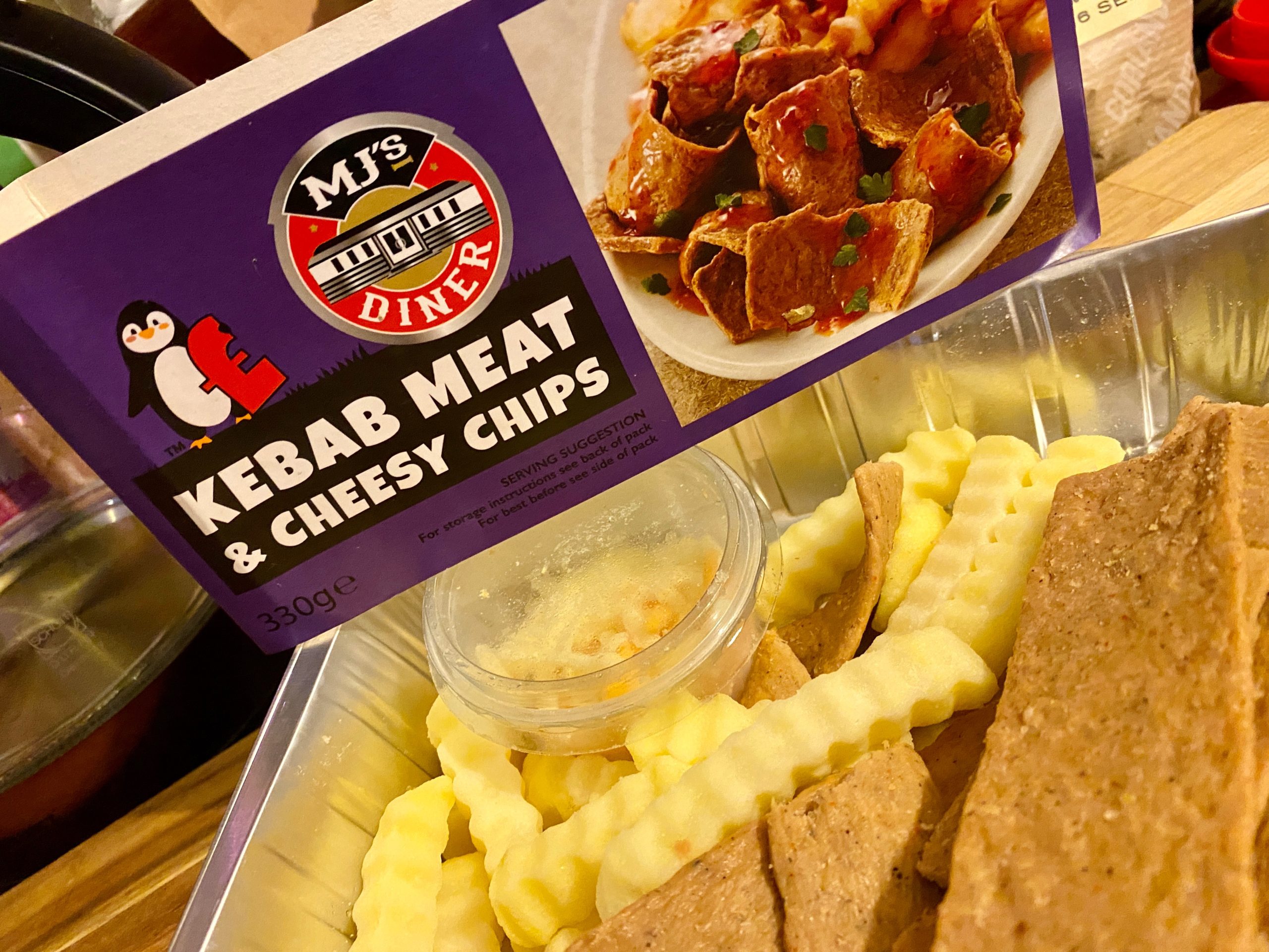 Kebab meat and cheesy chips before cooking
