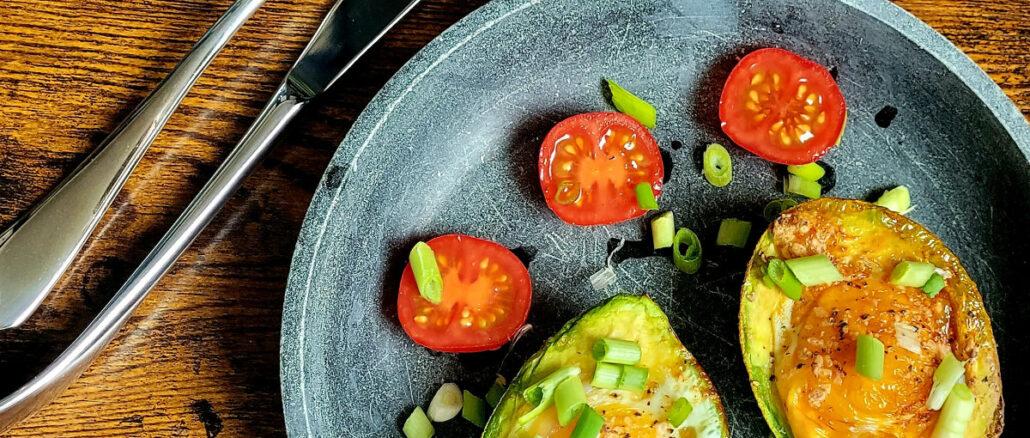 baked avocado eggs above