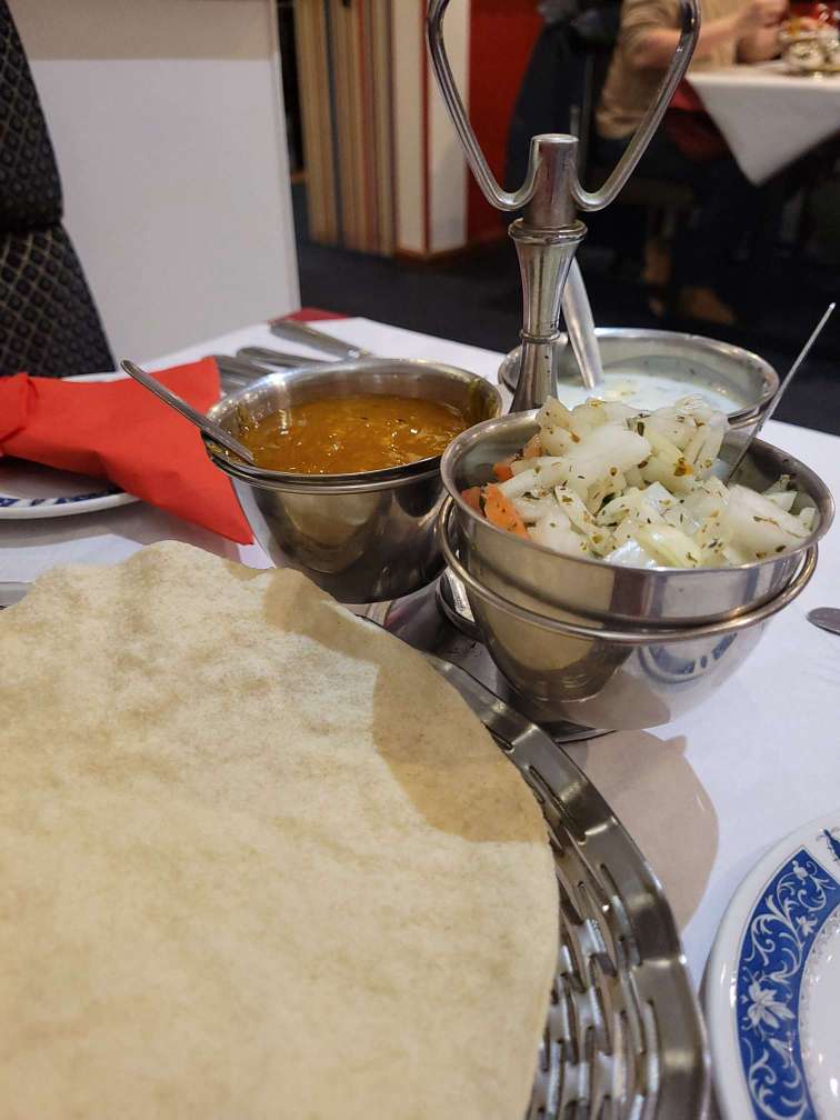 Poppadoms, spiced onions, chutney and raita at Prince of India Pitlochry
