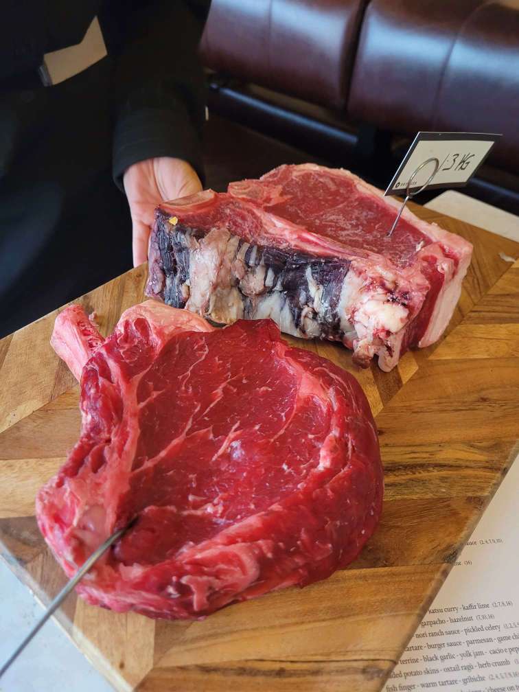 cuts of meat brought to table