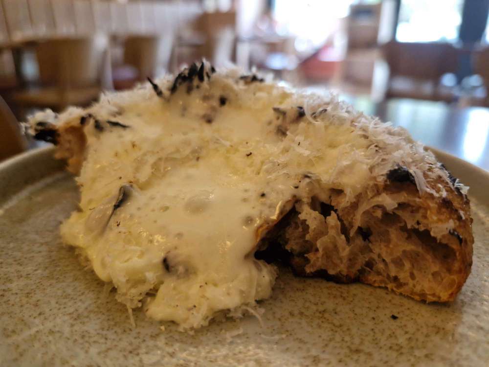 caramelised onion flatbread topped with aged Comté cheese.